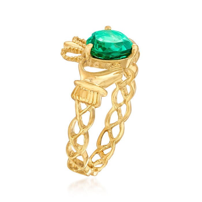 Gold-tone claddagh ring with large oval green simulated gemstone top view