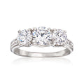 Three-stone CZ ring in sterling silver, three round stones in shared prong setting