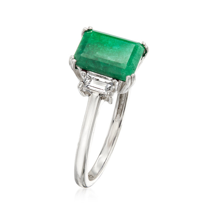 Sterling silver square emerald-green ring with baguette side stones, angled view