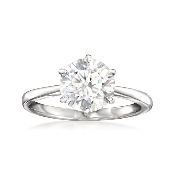 Sterling silver solitaire ring with round moissanite center stone, four prongs