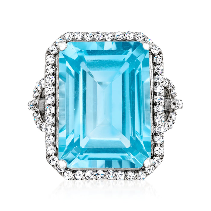 Sterling silver ring with large rectangular Swiss blue topaz center and white topaz halo
