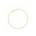 Yellow gold curb-link anklet, linked chain circle with no clasp detail visible