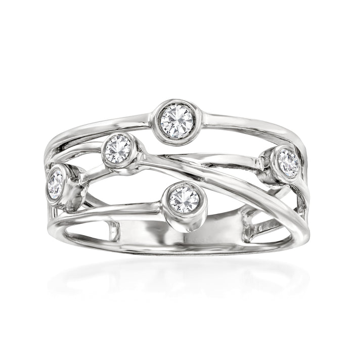 Sterling silver crisscross diamond ring with four round stones, polished band.