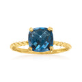 Twisted gold ring with large London-blue square topaz gemstone
