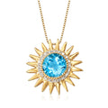 Gold sunburst pendant necklace with blue topaz center and diamond accents