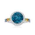 Sterling silver ring with oval London blue topaz, diamond halo, multicolor side gemstones