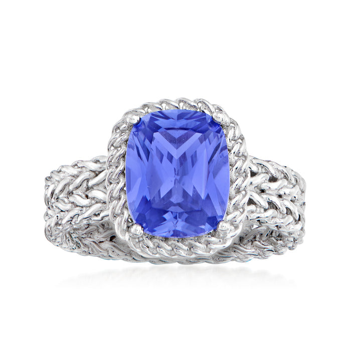 Sterling silver simulated tanzanite ring with oval blue stone and basketweave band