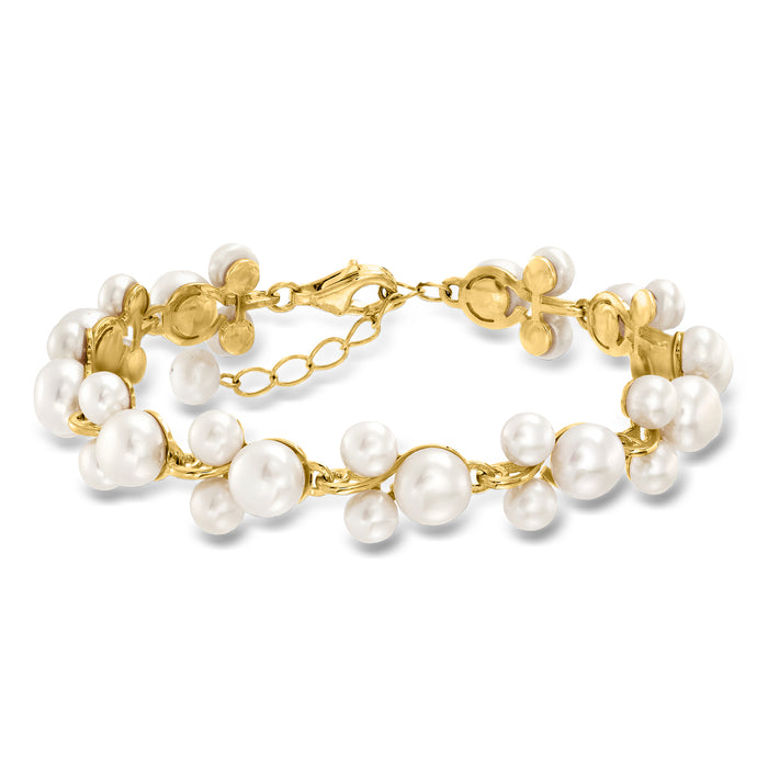 Gold-tone bracelet with round white cultured pearls and chain links, clasp at center.