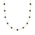 Black cultured pearl station necklace, round dark pearls on 14kt yellow gold chain
