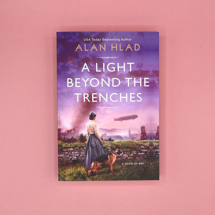 Book cover of 'A Light Beyond the Trenches' by Alan Hlad on a pink background
