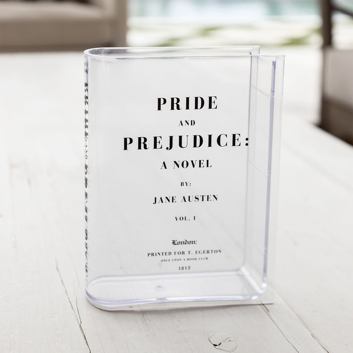 A clear acrylic vase designed to look like the title page of "Pride and Prejudice" by Jane Austen.