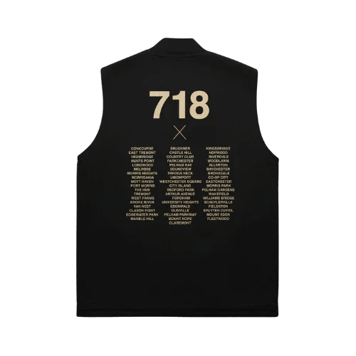 Black sleeveless shirt with gold text on a white background