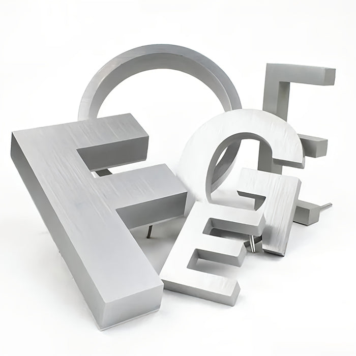 FramePlus silver painted aluminum letters and numbers, arranged in a balanced configuration with different sizes (4-inch and 6-inch) to showcase professional signage solutions