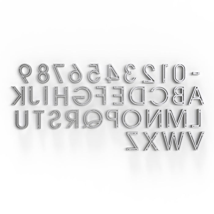Silver painted aluminum letters and numbers in Avant Garde Medium, arranged in a visually striking pattern with various sizes (4-inch and 6-inch) for impactful signage