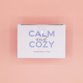 A light purple box labeled Calm and Cozy Chamomile Tea