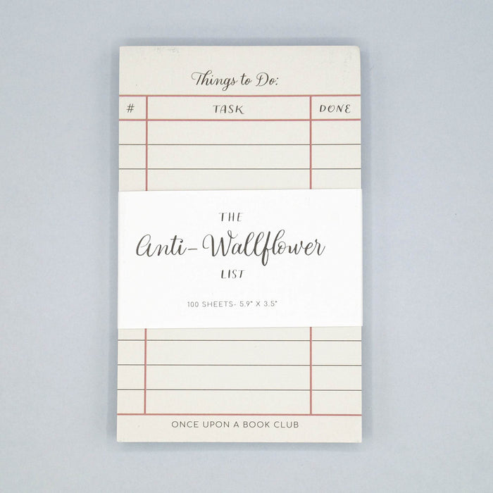 a white notepad labeled Things to Do with a white label across the center that says The Anti-Wallflower List