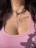 Fairy Silvermist Choker Necklace with gemstones on a person wearing a pink top.