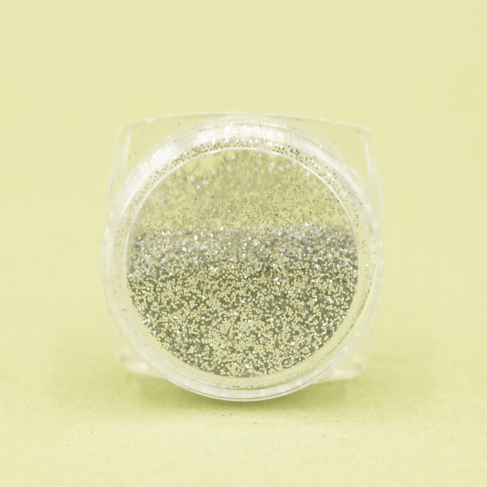 a side view of the pot of silver glitter eyeshadow.