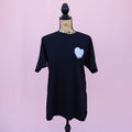 Black t-shirt with a purple heart-shaped candy design and 'Grumpy x Sunshine' text on a pink background.