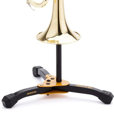 Trumpet/cornet stand with arched base, black arms and yellow plate under bell