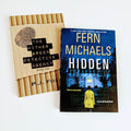 Light brown jacket for The Hither Green Detective Agency by PJ Fox, next to Hidden by Fern Michaels.