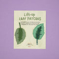 Lift-up Leaf Patches card with two green leaf patches attached. Text on the card says: Keep one patch for you to remember you are perfect as you are - and gift one to a friend with a note letting them know what makes them special!