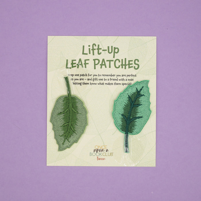 Lift-up Leaf Patches card with two green leaf patches attached. Text on the card says: Keep one patch for you to remember you are perfect as you are - and gift one to a friend with a note letting them know what makes them special!