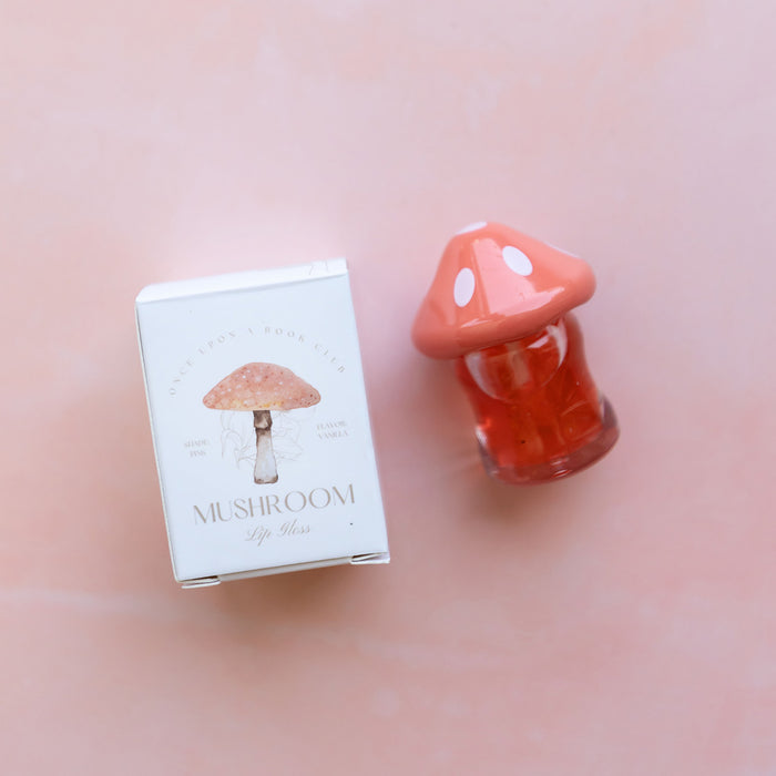 a mushroom shaped bottle of lipgloss and custom box.