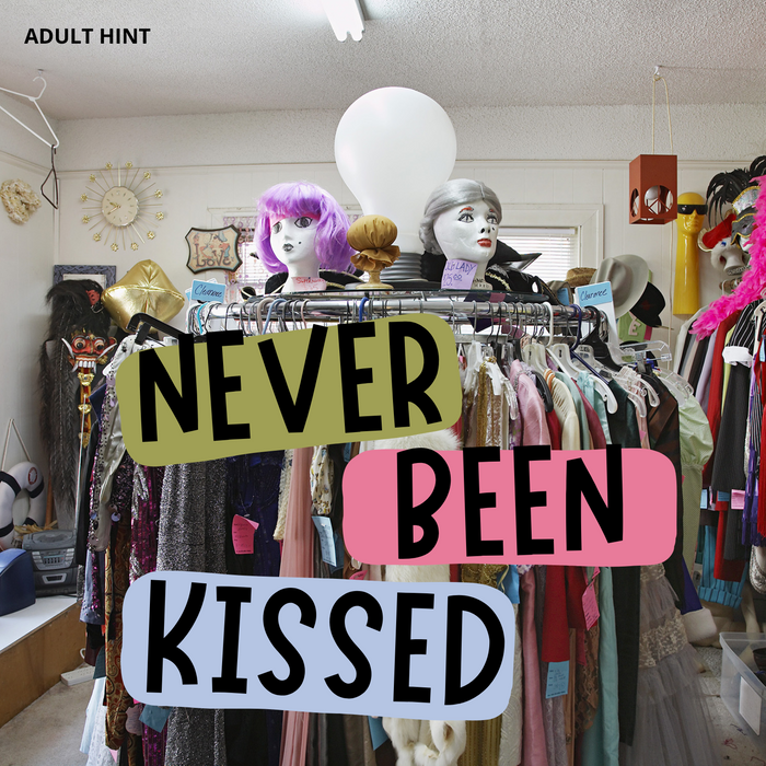 A thrift shop scene with mannequins and clothing racks, text overlay says Never Been Kissed.