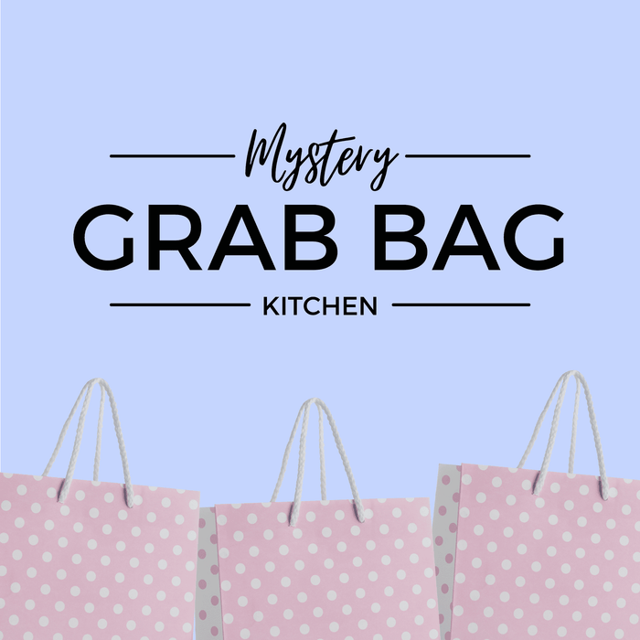 Mystery Grab Bag - Kitchen. There are pink polkadot shopping bags along the bottom of the image.