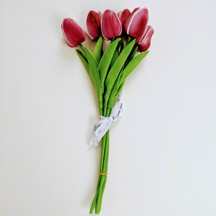 a bouquet of fake pink tulips
