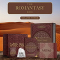 The Romantasy Box Volume 3 featuring The South Wind by Alexandria Warwick featuring red and gold details. Surrounding by red and gold packaging. All components stand in front of a desert background.