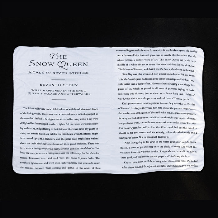 The reverse side of the Snow Queen Blanket showing the Seventh Story book pages.