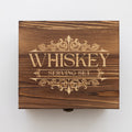 a wooden box labeled Whiskey Serving Set