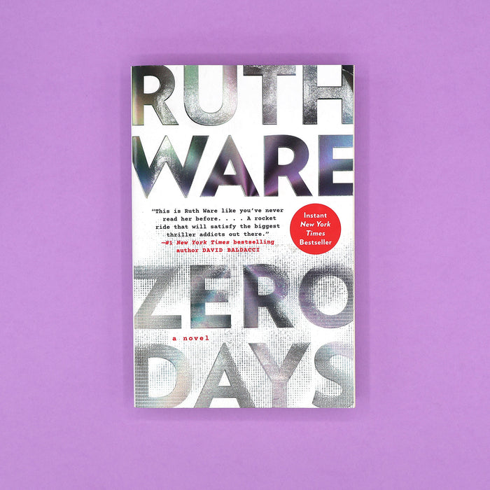 Book cover of 'Zero Days' by Ruth Ware on a purple background